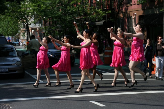 Cupcake Cadet Corps members Becka Vargus, Emily Wassyng, Sheiline McGraw, Marla McReynolds, Summer Brown, and Joseph Schles charge across Bleecker Street in West Village