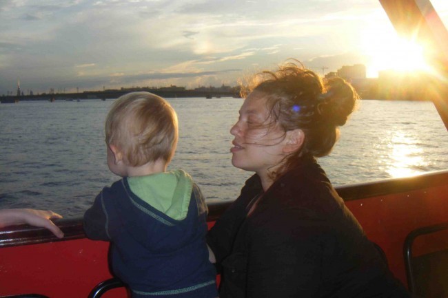 Alexandra and her son enjoy a boat ride after her workshop