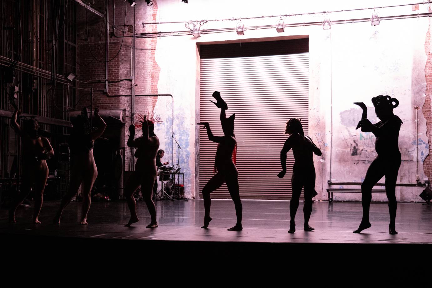 dancers in single line, silhouette, in various poses