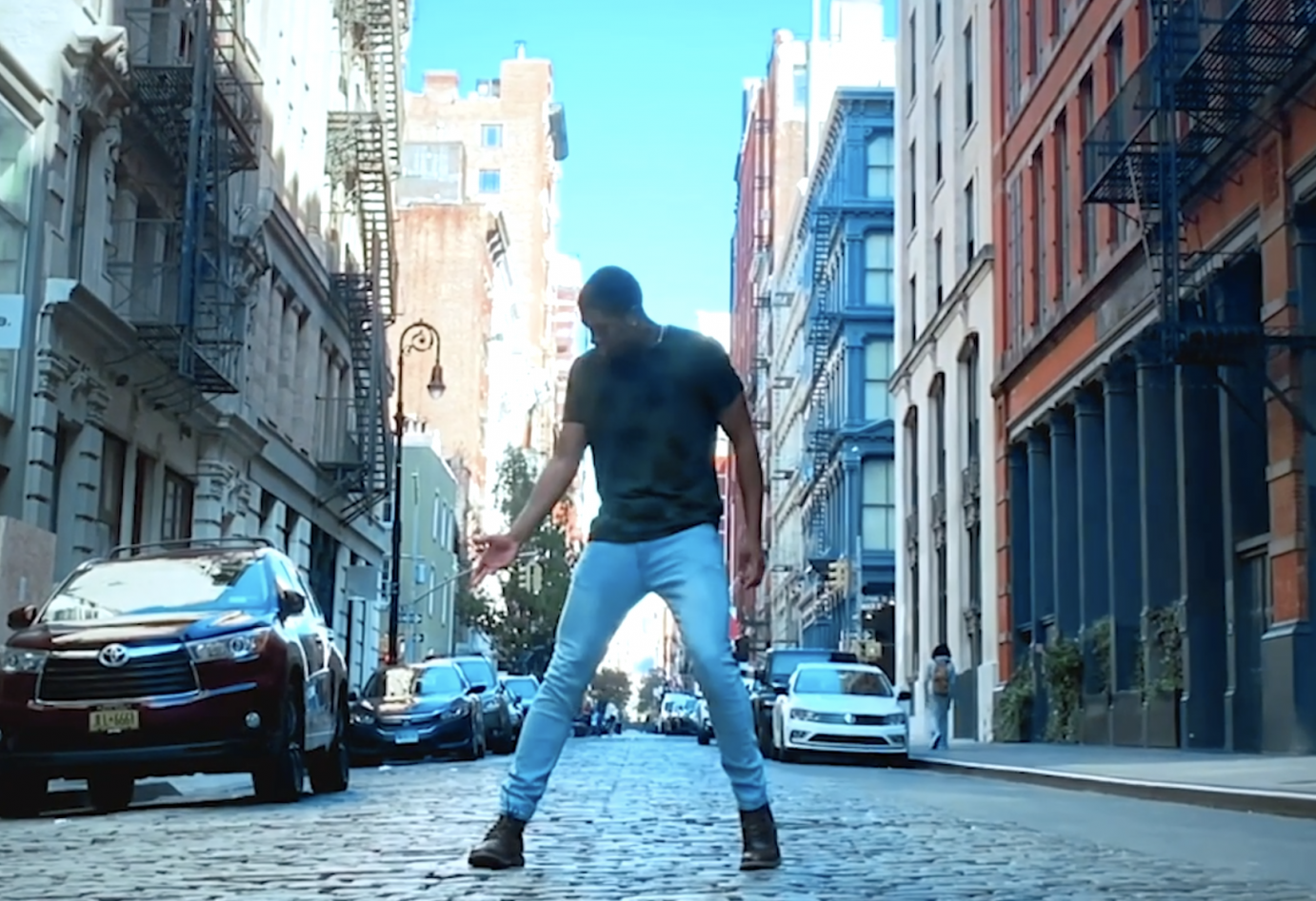 Christopher Grant dances on a New York street