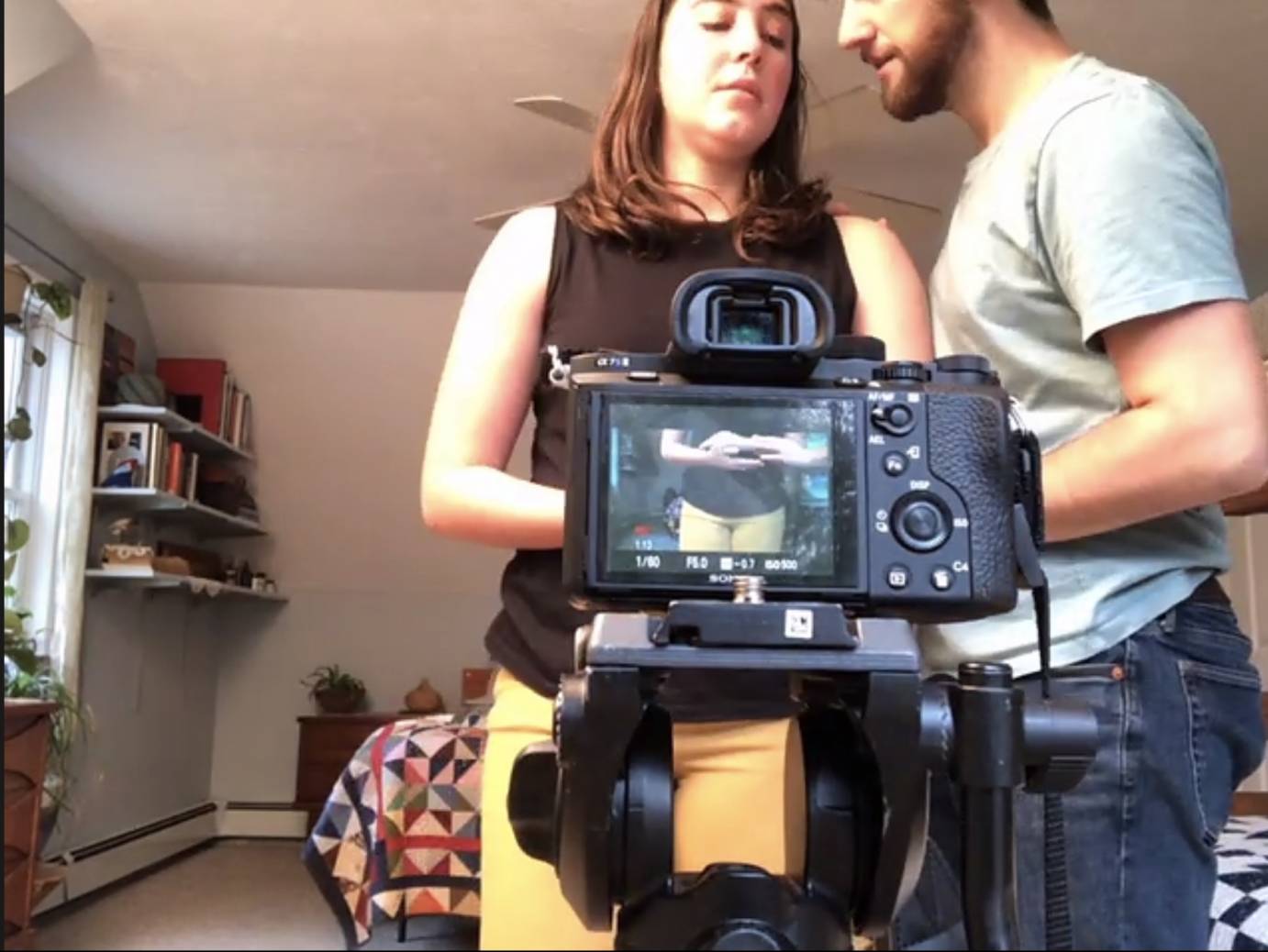 Hollis Bartlett and Nattie Trogdon look at a video recorder