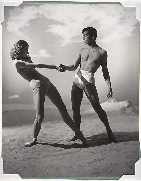 Tanaquil Le Clercq and Nicholas Magallanes holding hands mid-dance on Jones Beach.