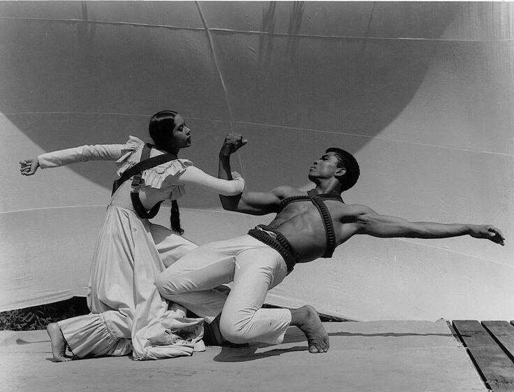 Alvin Ailey hinges backward as Carmen de Lavallade hooks arms with him