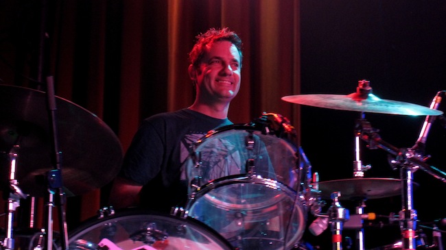 Marty Beller Playing the Drums. Photo by Glimpses of Soul Photography.
