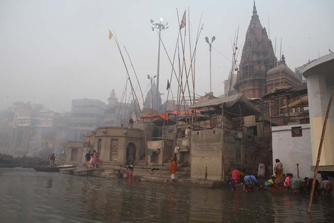 Early morning view of people washing in the Ganges.