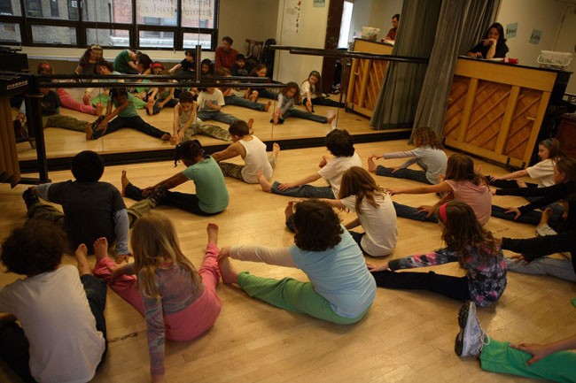 Miles Starts Class With Floor Work as Calhoun Lower School Director, Alison Max, Looks On