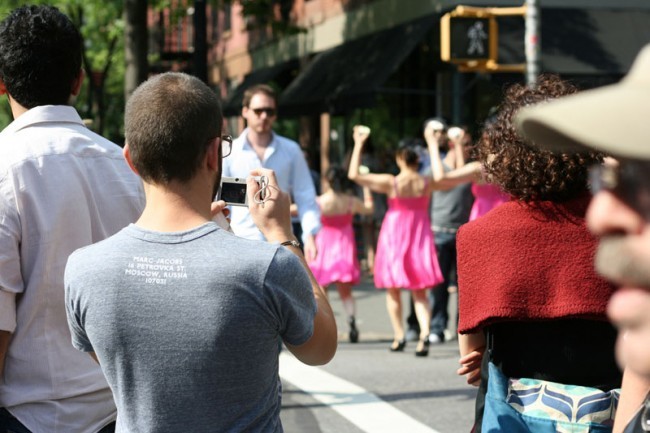 Cupcake Cadets disappear into the crowd of tourists and shoppers on Bleecker Street