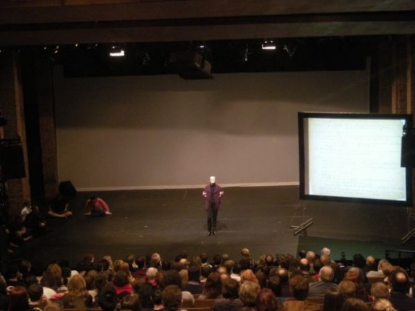 Janet Eilber, Artistic Director of The Martha Graham Dance Company begins the showings by speaking about the history of The Martha Graham Company, the relative \'newness\' of Classic American Modern Dance to the performing arts, the question of how to preserve classic works yet move classic dance companies into the future, and the original 1938 version of American Document- Ann Bogart, SITI COMPANY Artistic Director refers to refers to Eilber as an enlightened artistic director.