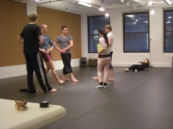 Graham Company Dancers work on placement while a SITI actor Ellen Lauren works on her Graham