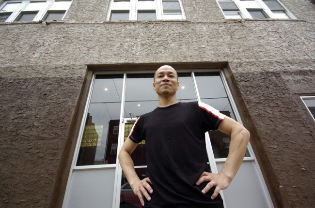 Kun Yang Lin at the entrance to Chi Movement Arts Center- A Former Warehouse in South Philadelphia- Now His Artistic Home.