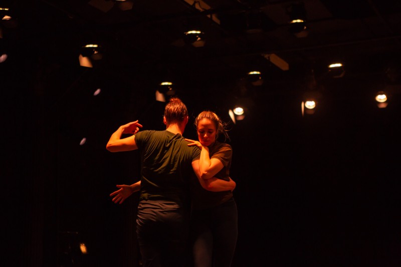 A man and woman slow dance