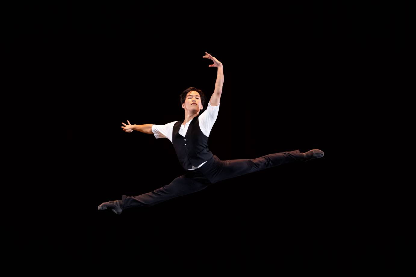 male dancer in grand jete