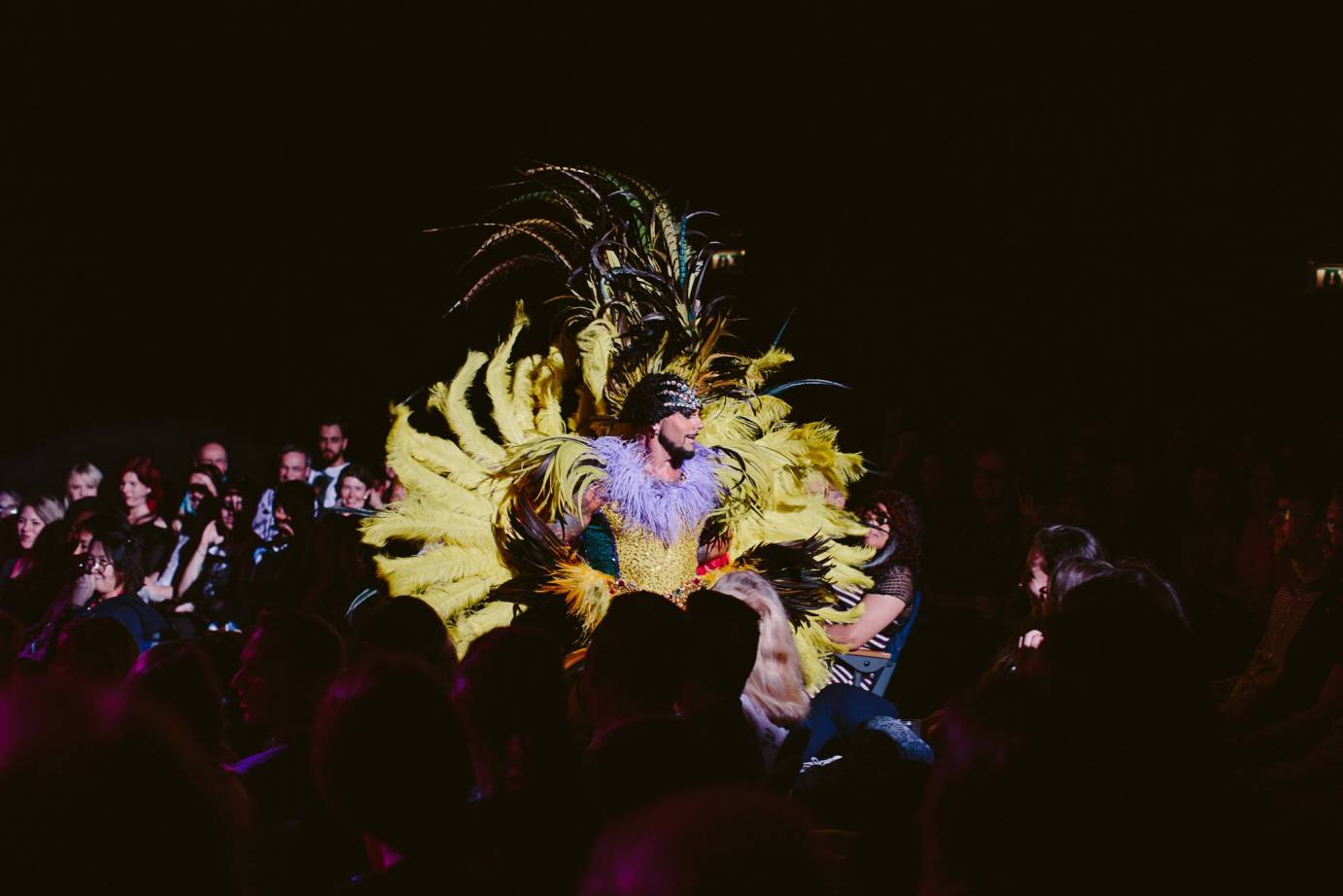 Man dresses as a glittery pirate commands the audience