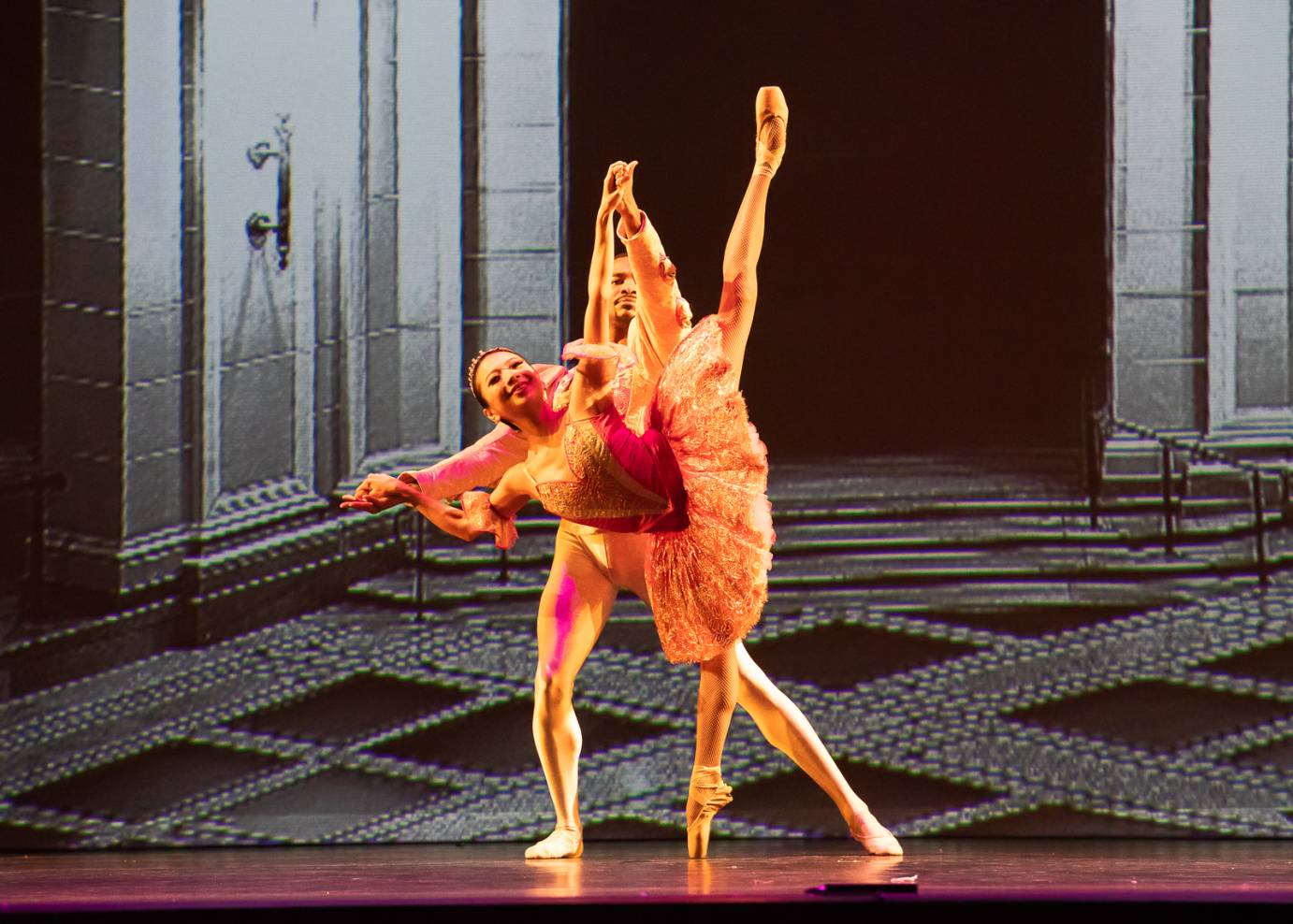 A pas de deux with a deep, partnered penchee