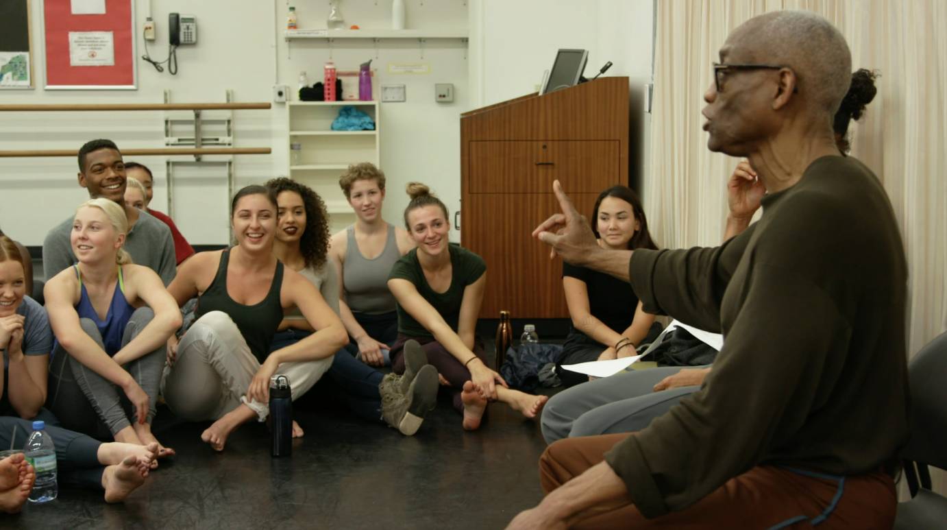 Bill T Jones addresses the students sitting in front of him