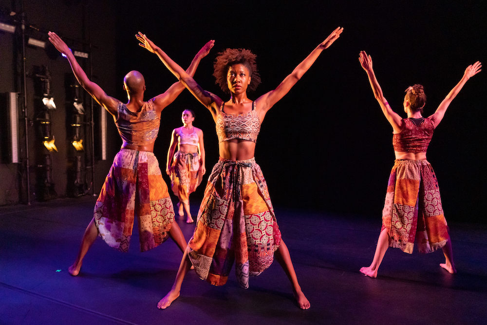 Dancers Staring out Arms in V shape