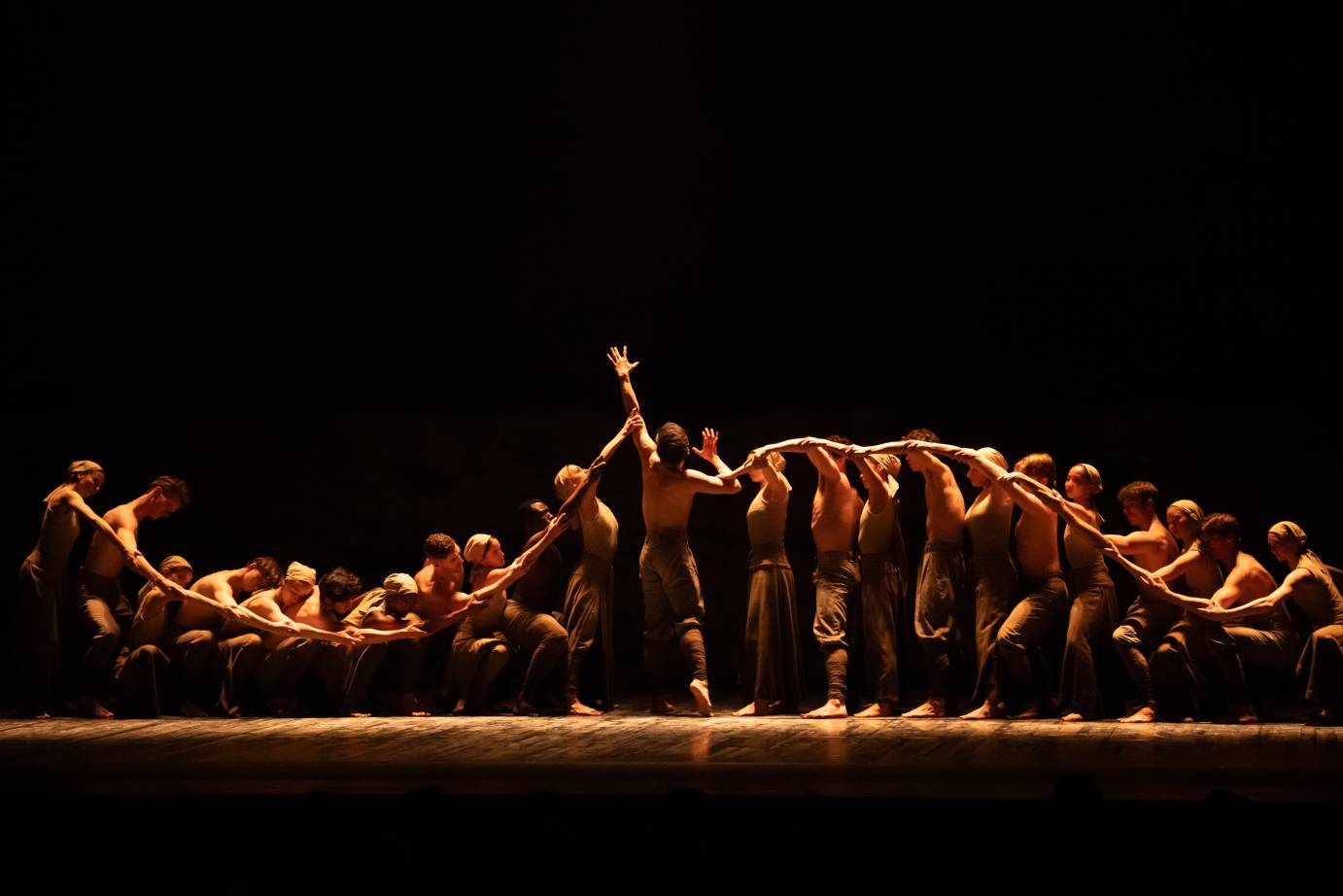 the corps configured to look like a large snake on either side of the main character 