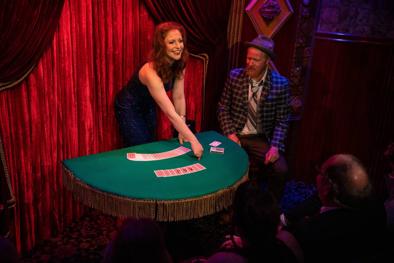 Joan DuKore at a table with playing cards