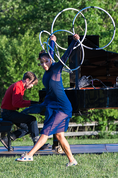 Now ShanDien LaRance uses her hoops and dance to become a butterfly. 