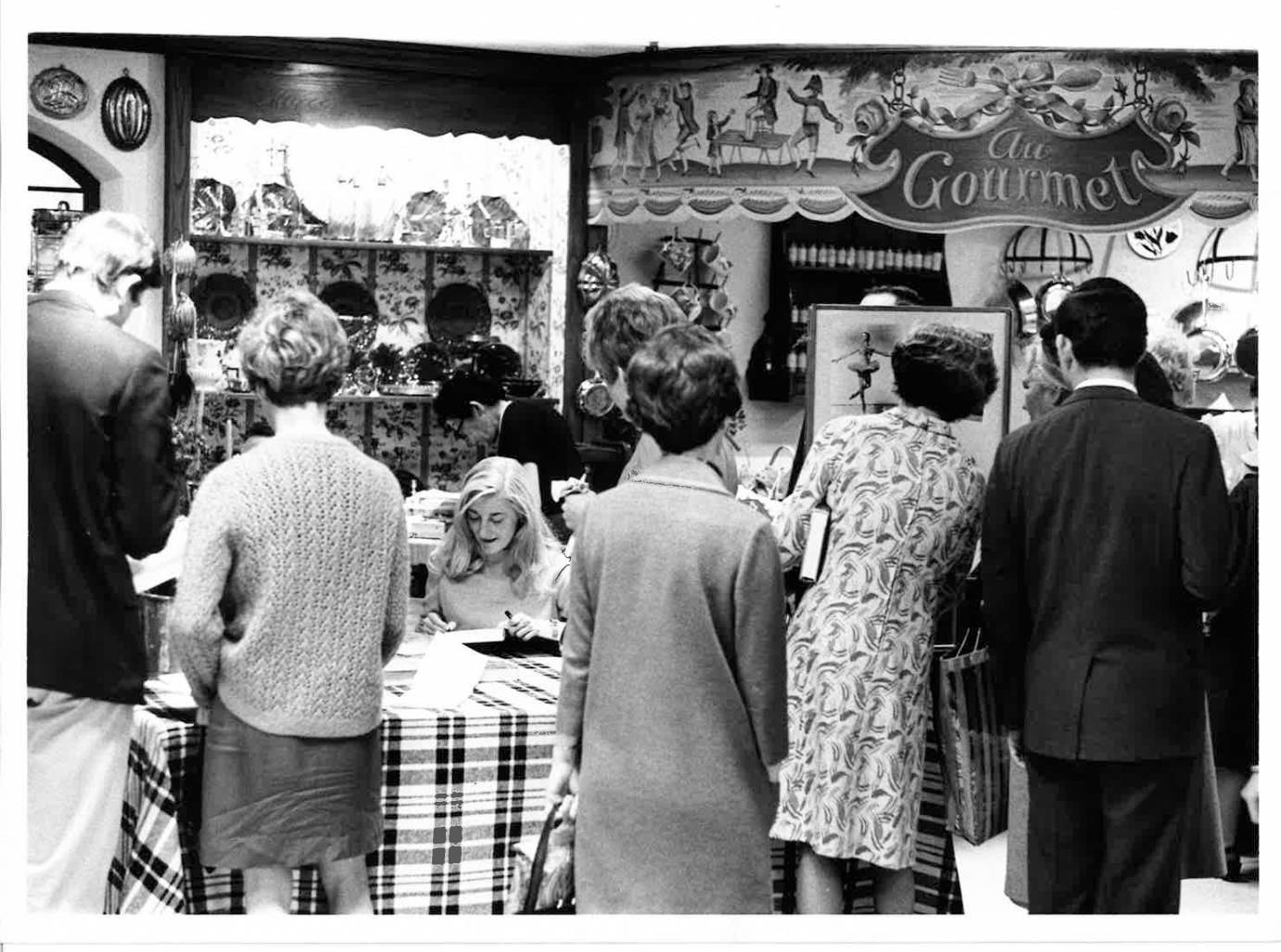 An old photograph of a book signing event for the initial release of Tanaquil Le Clerq's 