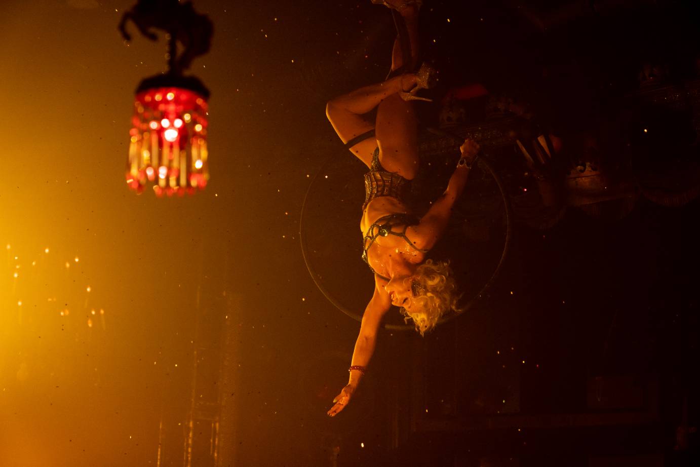 Marcy OperaGaga Richardson twirls on an aerial hoop