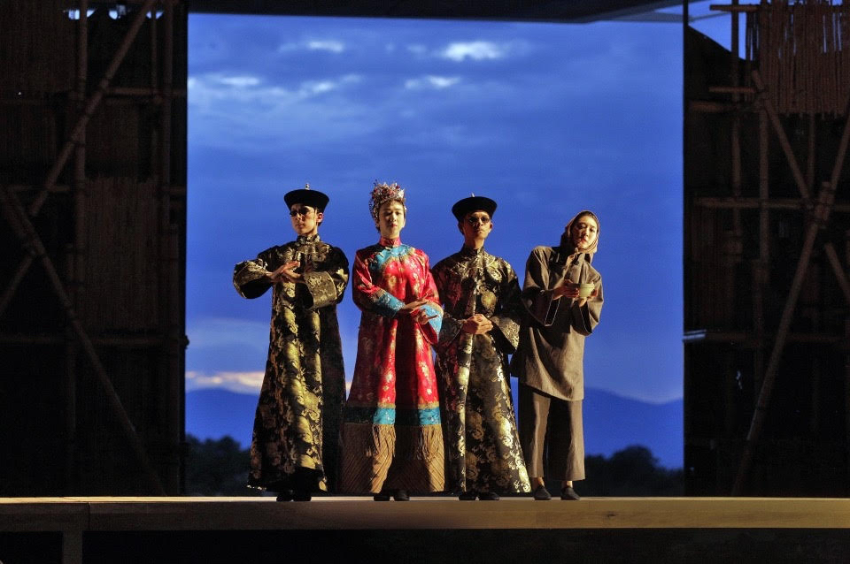 Four individuals including Stanton Jacinto in luxurious Asian costumes