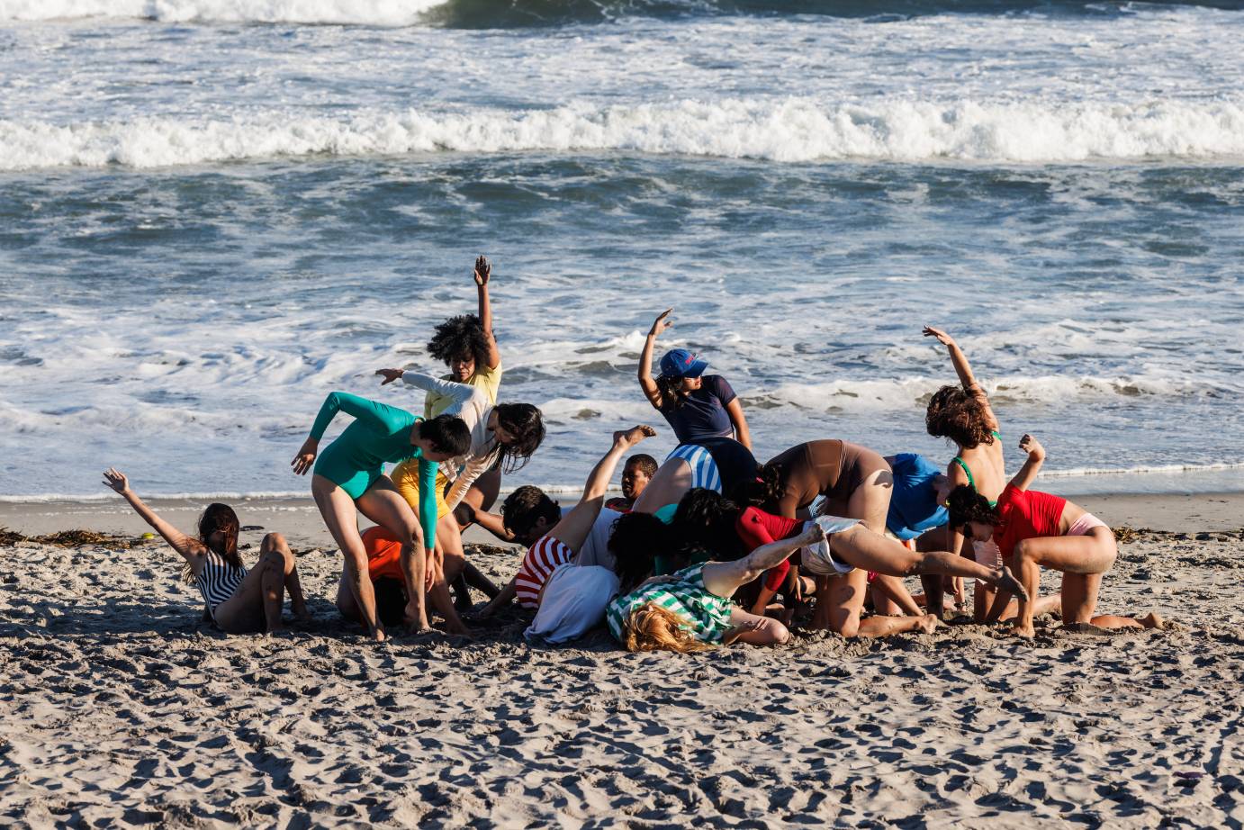 Kim Brandt's Dancers frolicking on the beach 