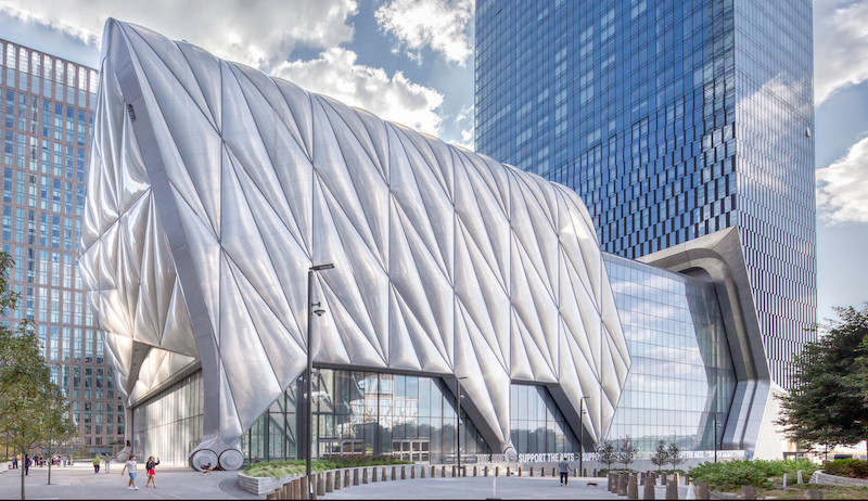 The Shed's triangular-paned building is surrounded by the buildings of Hudson Yards