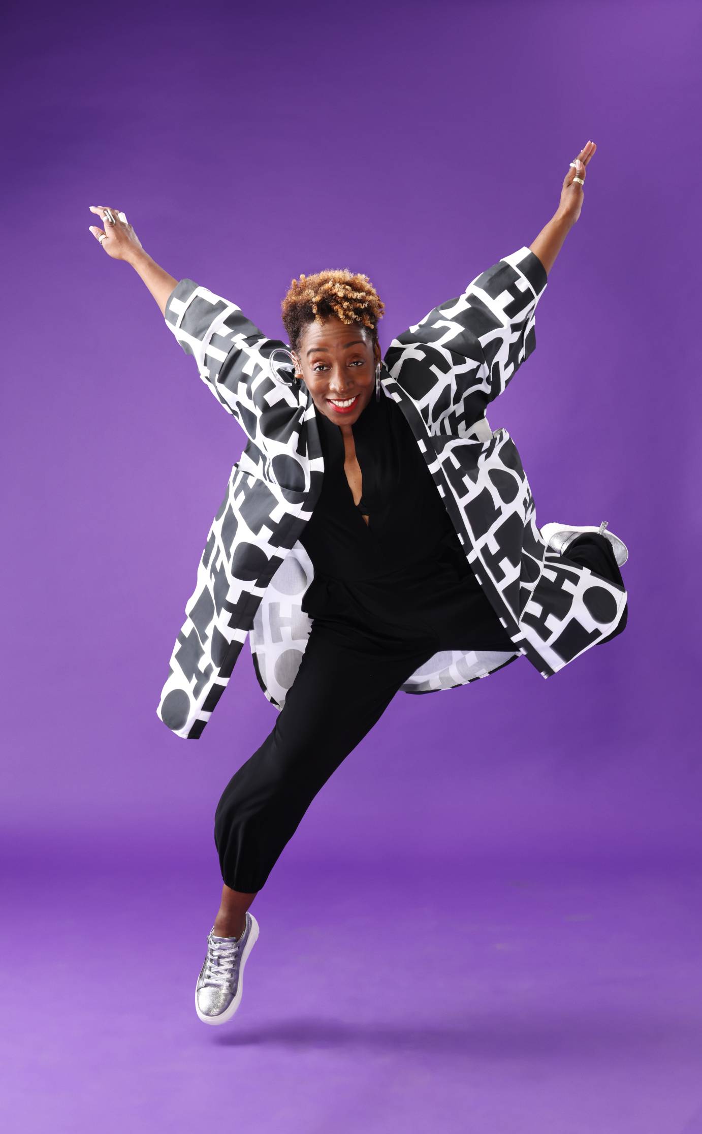 the exuberant LaTasha Barnes Swinging in a Studio shot 