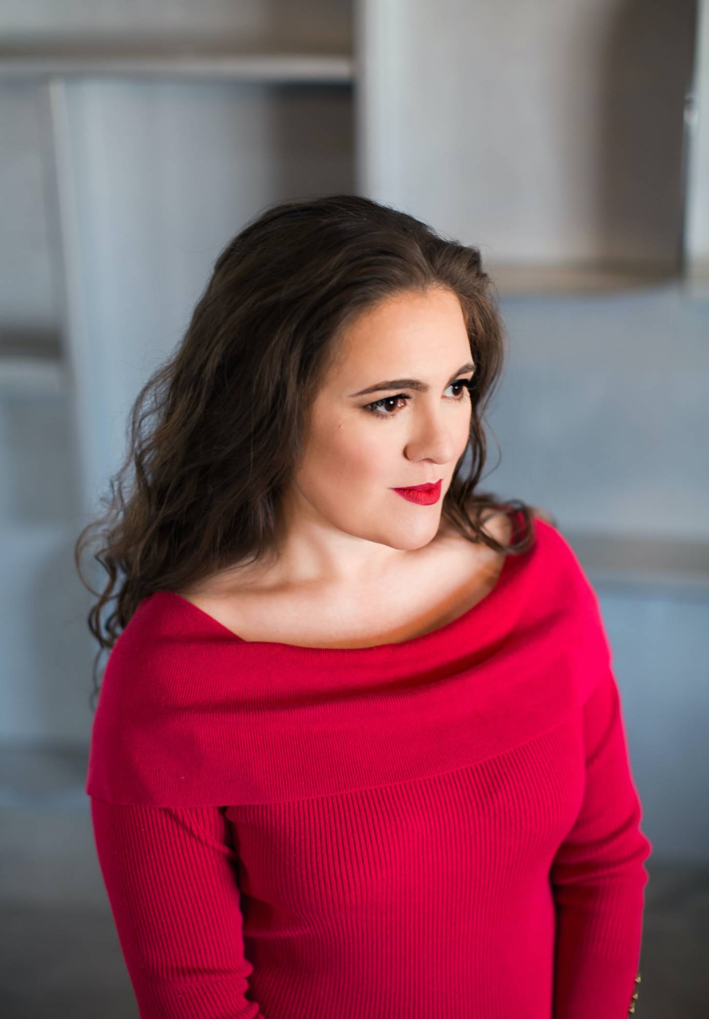 Headshot of Yvonne Montoya in a red sweater