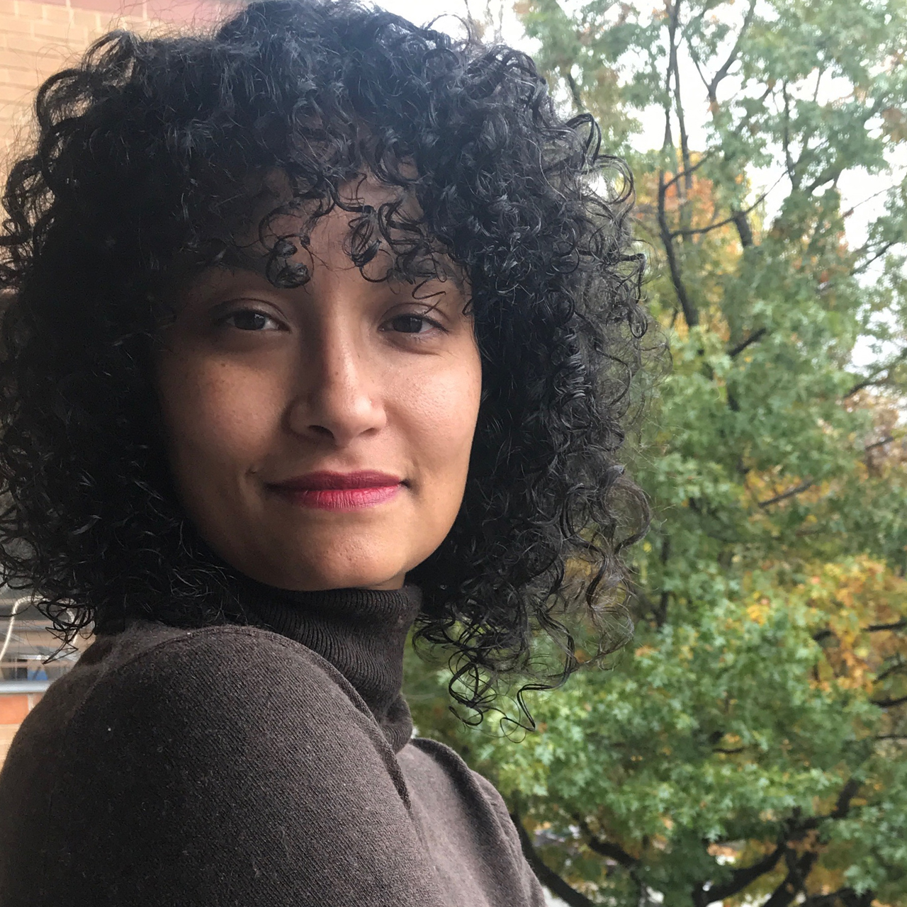 Headshot of Ailey director Jamila Wignot